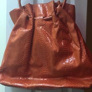 Orange unlisted bag